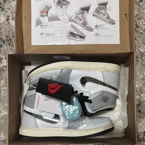 Women’s White and Gray Jordan 1s
